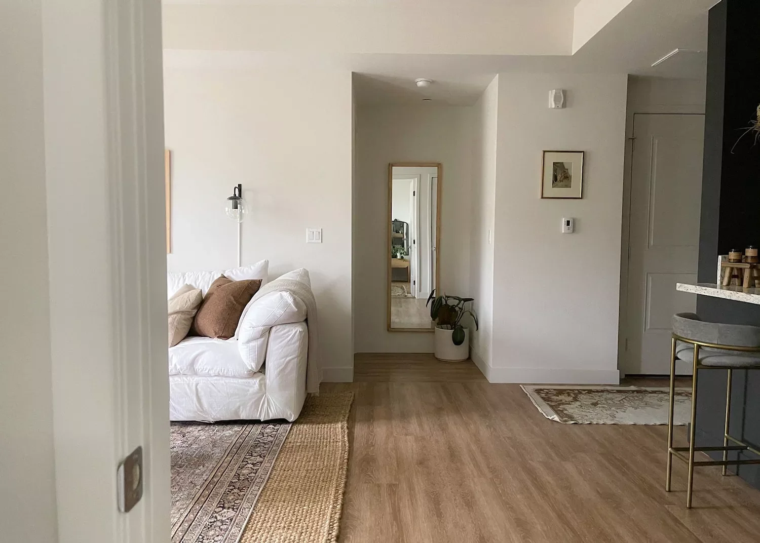 19 Affordable Ways to Transform Your Apartment Living Room 14 Layer Rugs