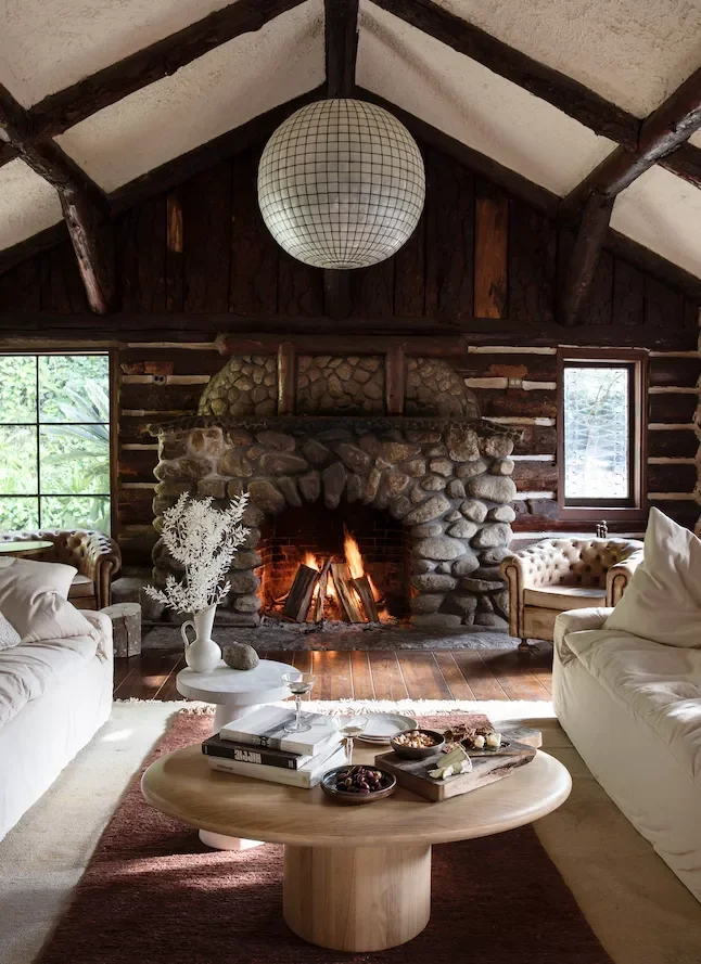 33 Autumn Living Room Ideas That'll Make Your Space Feel Incredibly Cozy 21 Layered Rugs