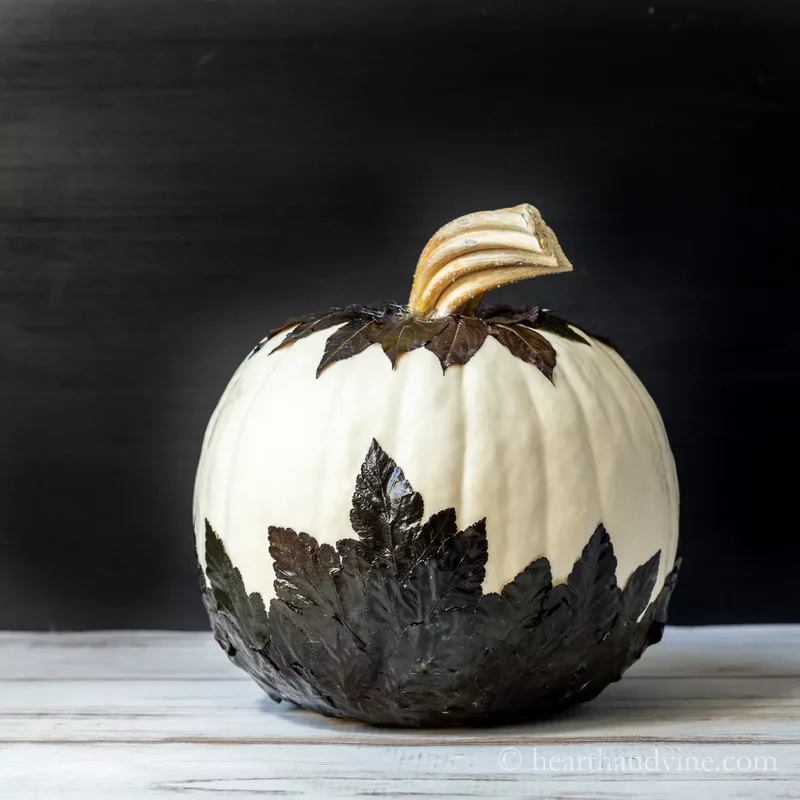 90 Creative Halloween Pumpkin Decorating Ideas to Try This Season 80 Leaf Covered Pumpkin
