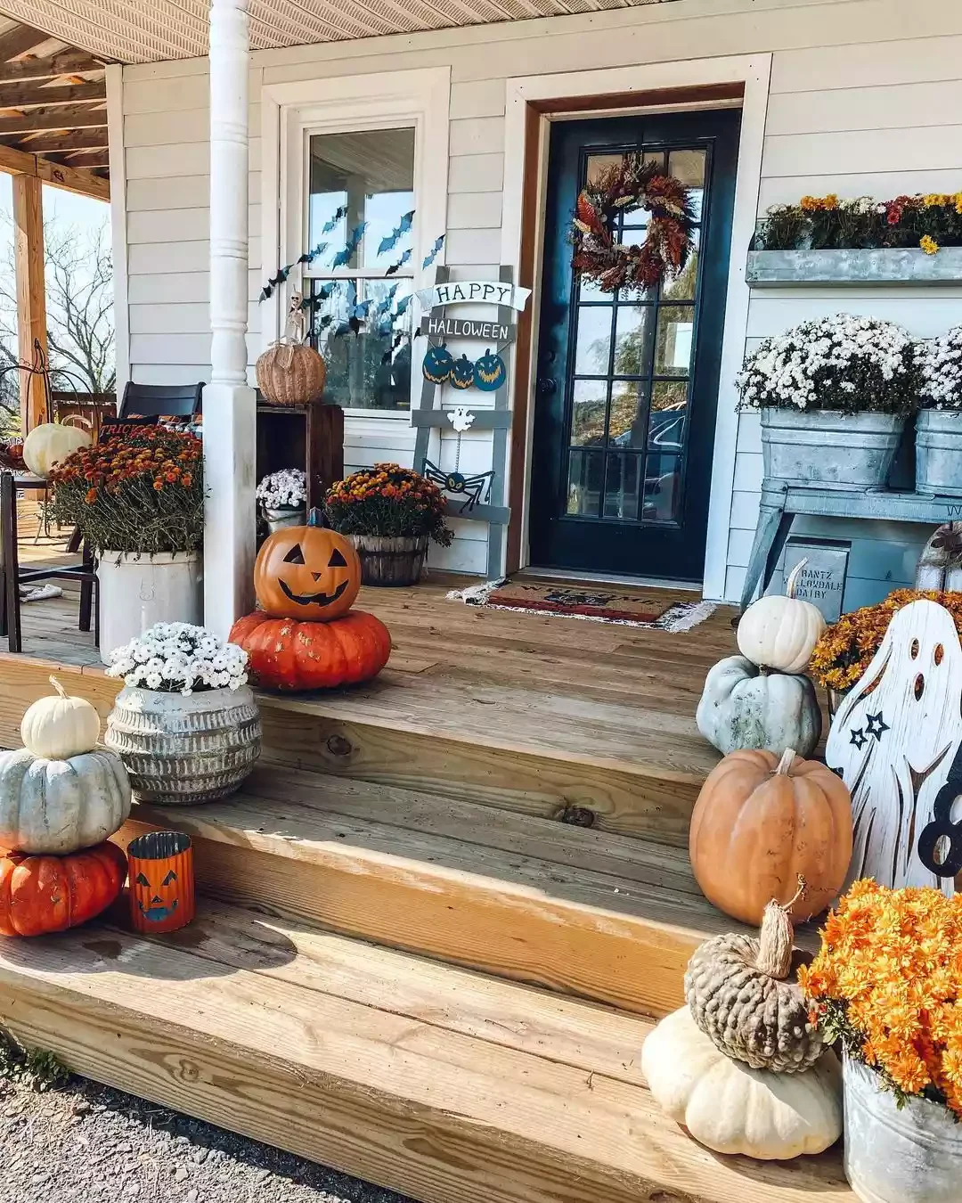 33 Spooktacular Halloween Front Porch Ideas That'll Make Your Home the Neighborhood's Must-See Destination 23 Lean Into a Farm House Look