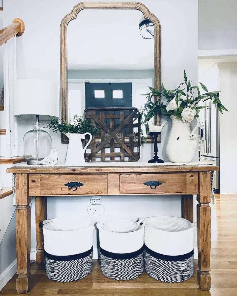 30 Stunning Entryway Table Styling Ideas That Welcome You Home 7 Lean a Woven Tray for a Rustic Look