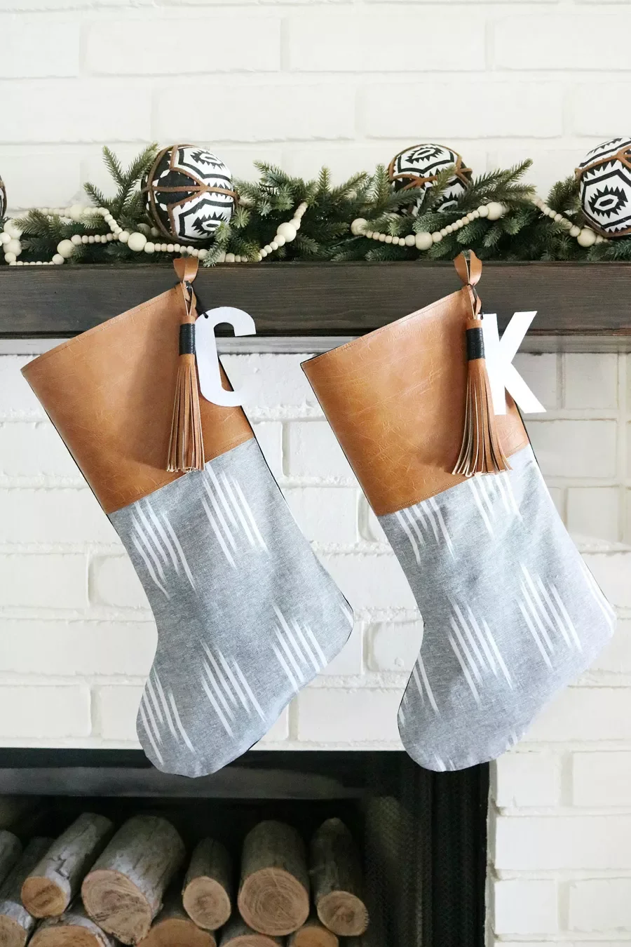 41 Creative DIY Christmas Stocking Ideas That Will Transform Your Holiday Decor 32 Leather and Tassel Stockings