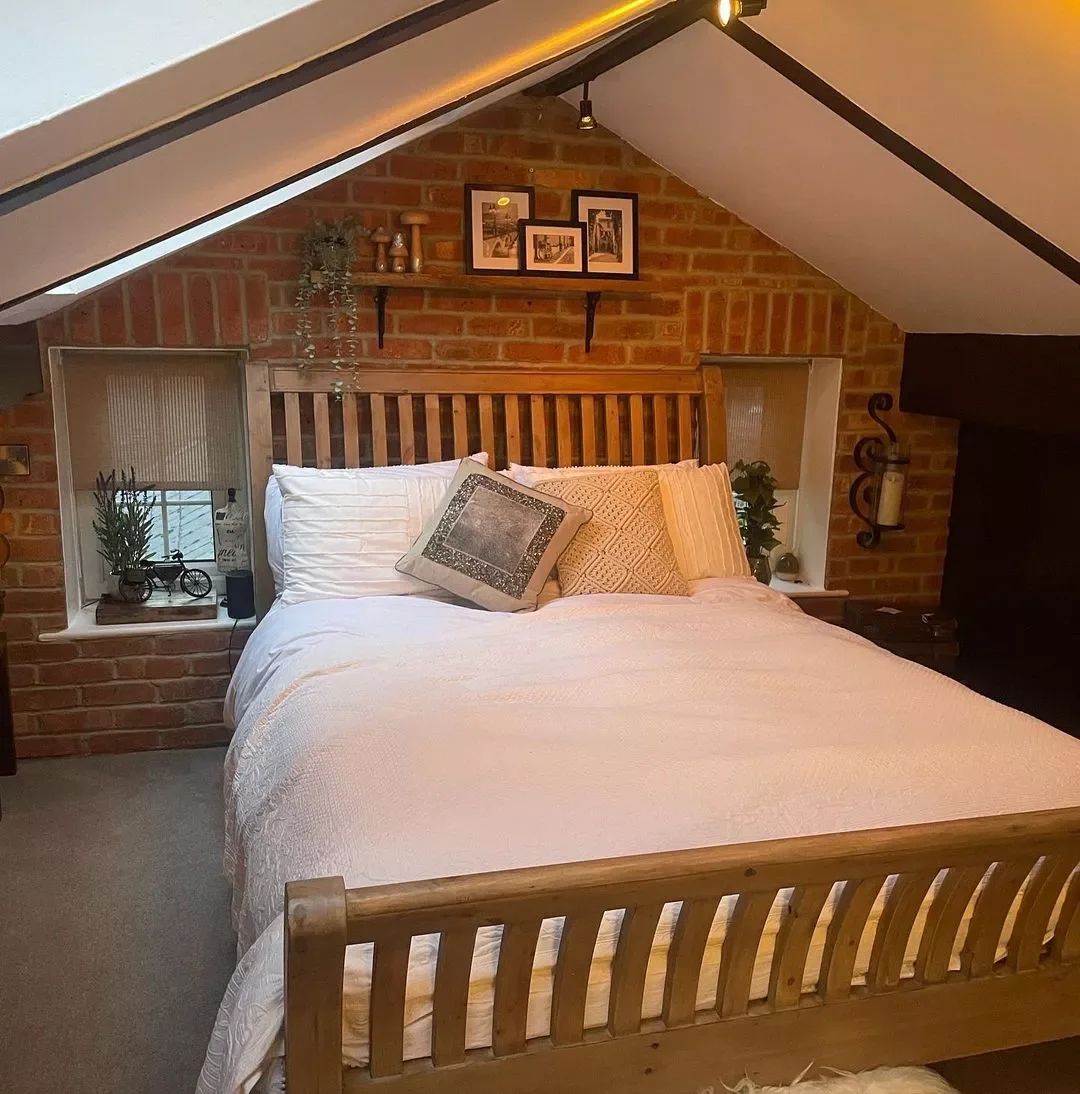 33 Cozy Attic Bedroom Ideas That Will Transform Your Space 19 Leave Brick Exposed