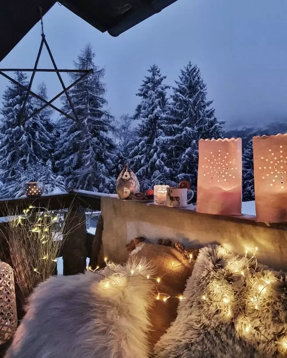 25 Christmas Balcony Ideas That Create a Holiday Wonderland Ledge Lined With Lanterns