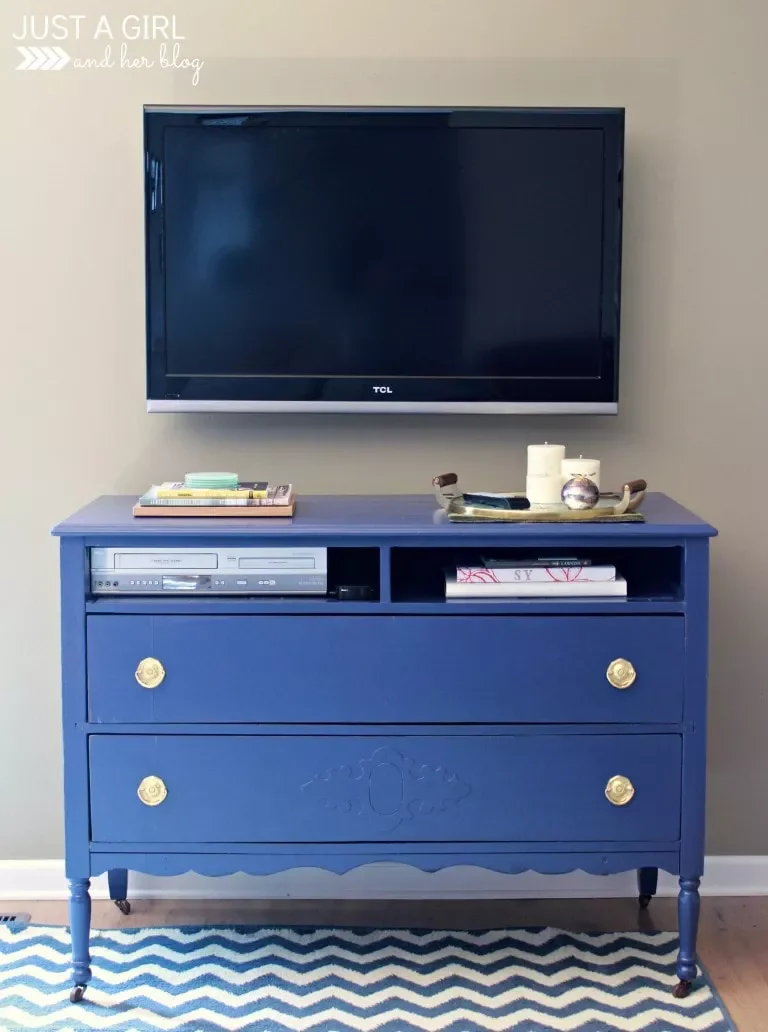 21 Beautiful Ways to Style Your TV Console Like a Pro 17 Let Bold Paint Do the Talking