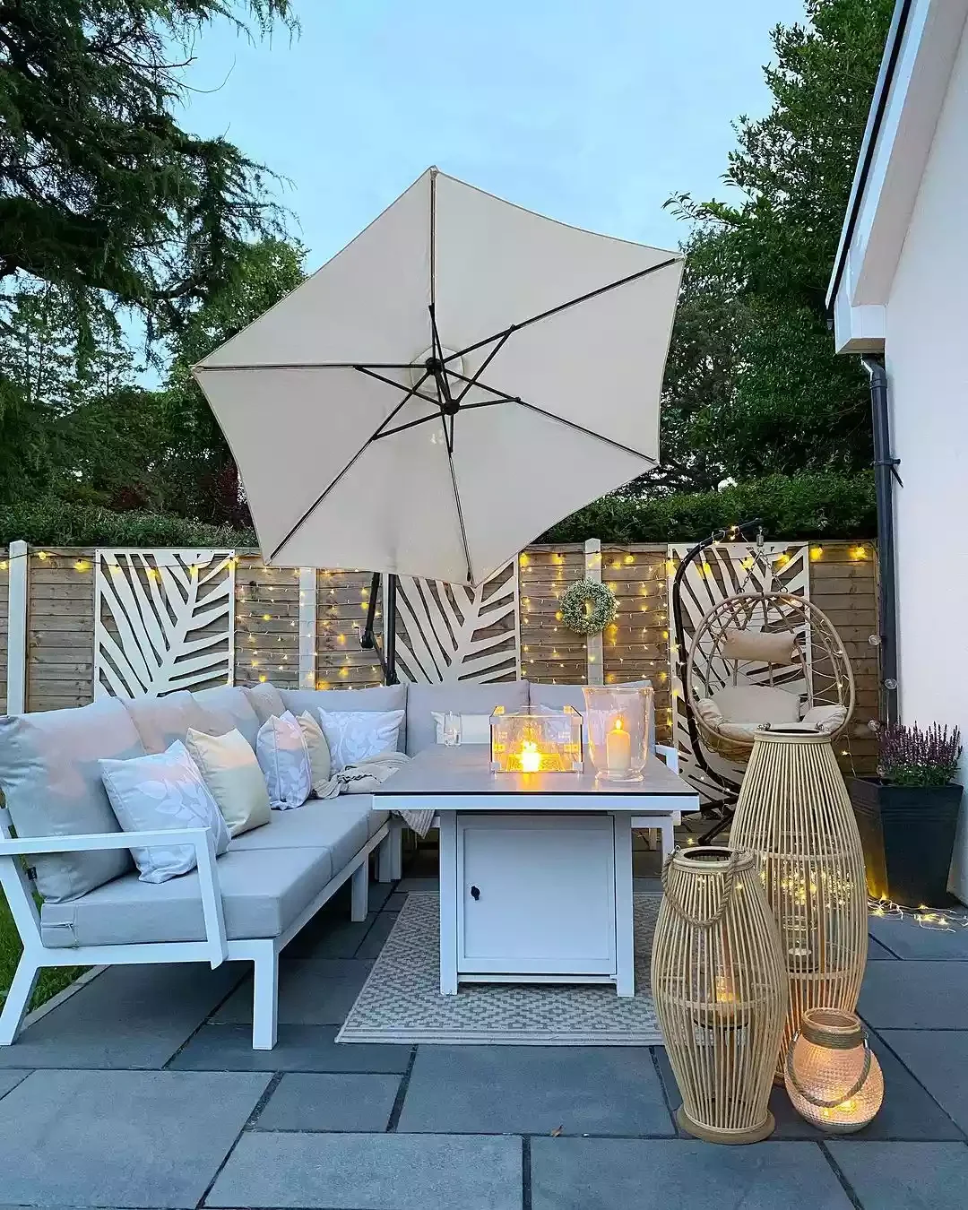 30 Beautiful Ways to Transform Your Patio with String Lights 26 Let Lights Cascade