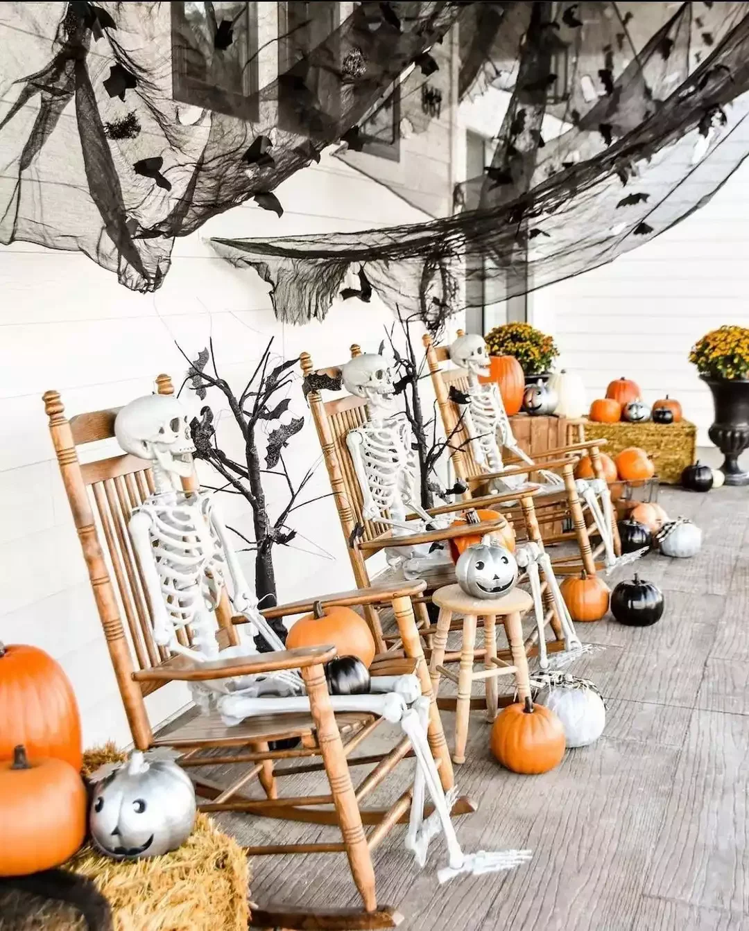 33 Spooktacular Halloween Front Porch Ideas That'll Make Your Home the Neighborhood's Must-See Destination 4 Let Your Skeletons Lounge