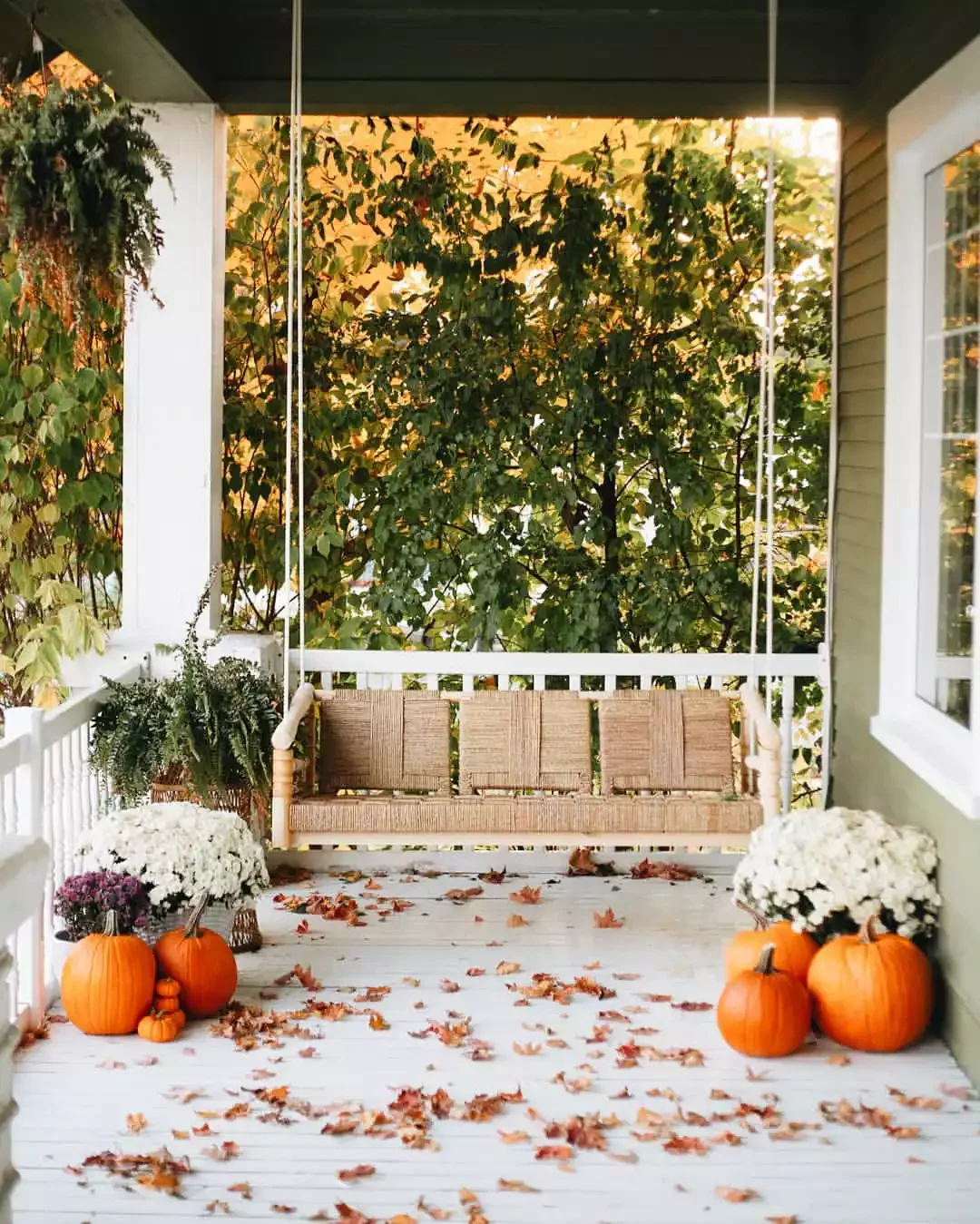 52 Autumn Front Porch Ideas That Will Transform Your Home's Entrance This Fall 8 Let the Leaves Pile Up