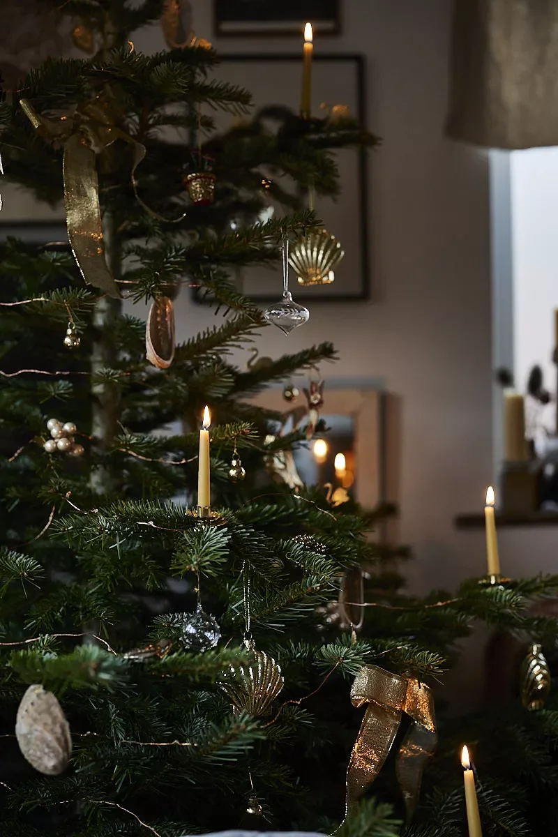 115 Stunning Christmas Decorating Ideas to Transform Your Home This Holiday Season Light the Christmas Tree With Candles