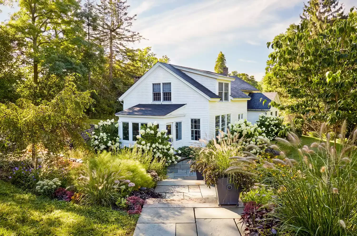 34 Stunning Front Yard Flower Bed Ideas That Will Transform Your Curb Appeal 35 Line Walkways With Grasses and Flowers