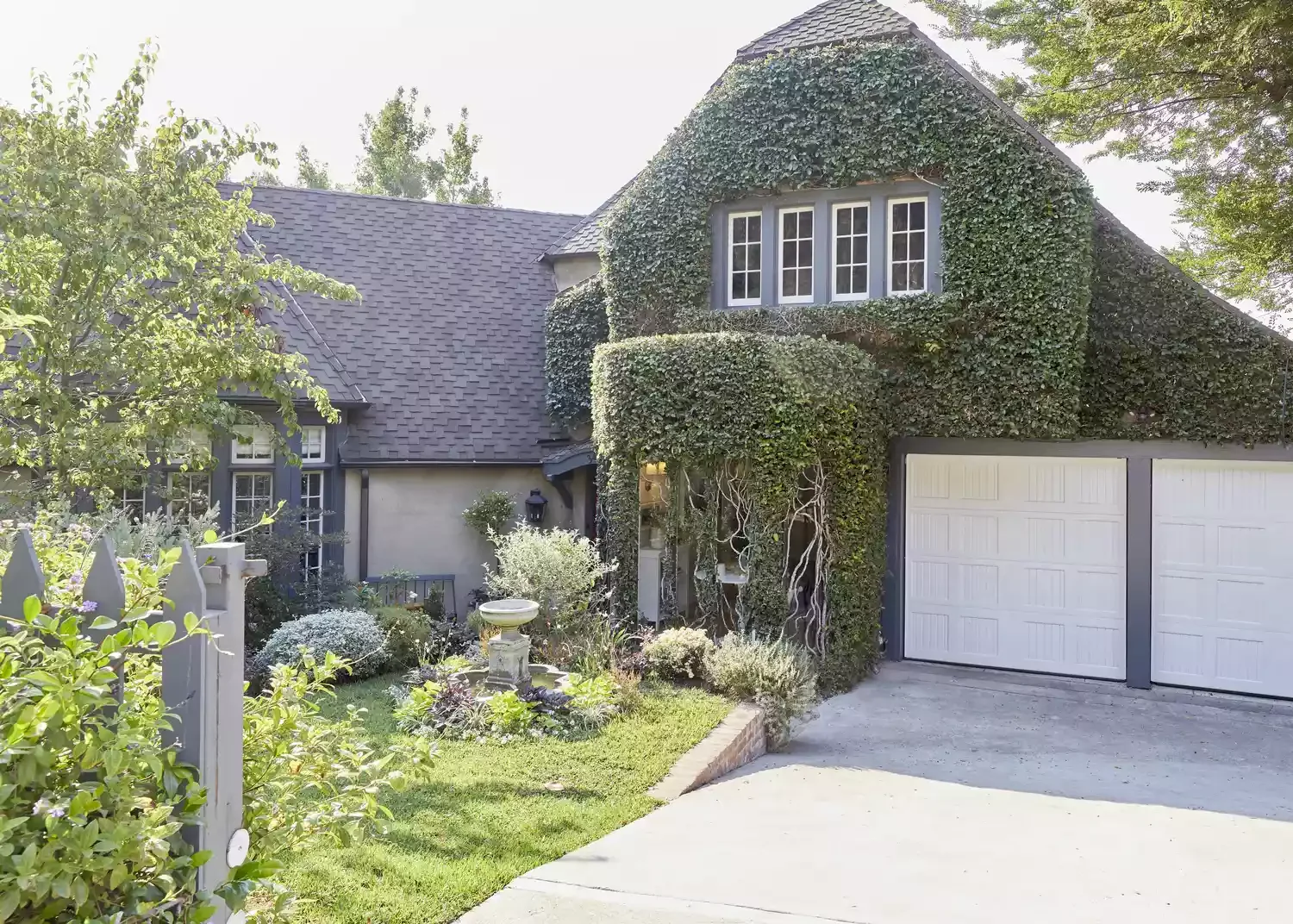 34 Stunning Front Yard Flower Bed Ideas That Will Transform Your Curb Appeal 27 Line a Garden Path for a Woodland Retreat