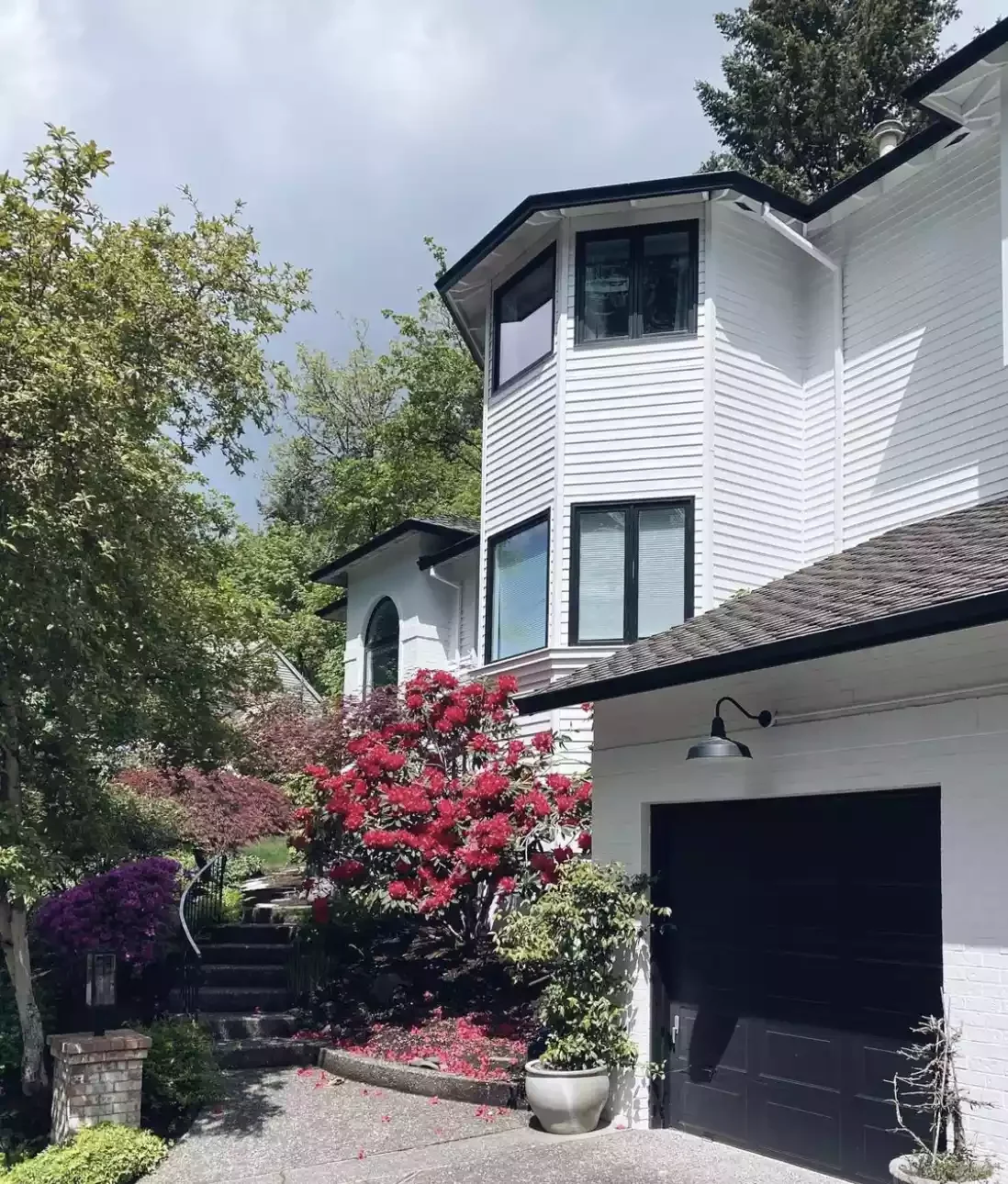 34 Stunning Front Yard Flower Bed Ideas That Will Transform Your Curb Appeal 7 Line the Staircase with Flowers and Trees