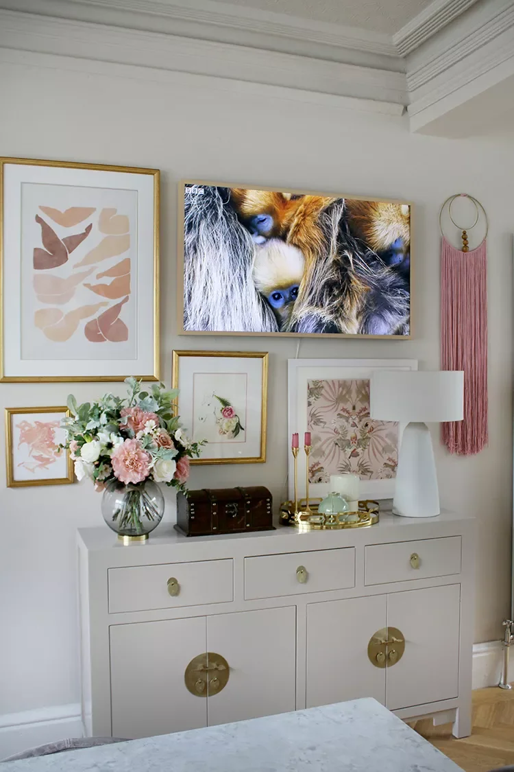 21 Beautiful Ways to Style Your TV Console Like a Pro 2 Look to Your Walls