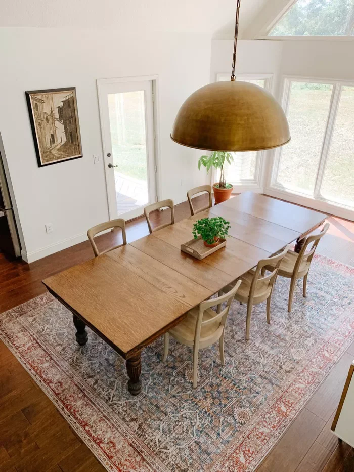 35 Beautiful Dining Room Rug Ideas That Will Transform Your Space 14 Make It a Vintage Rug