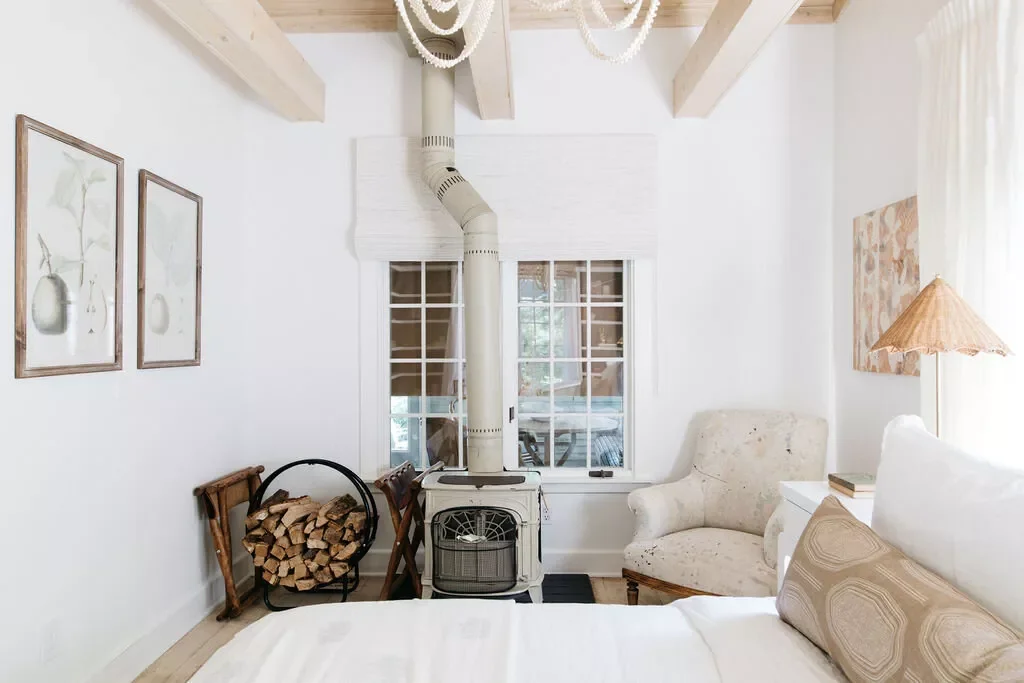 55 Stunning Bedroom Fireplace Ideas That Will Transform Your Sleep Sanctuary 47 Make It a Wood Burning Stove