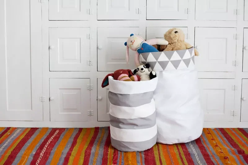 36 Clever Hidden Toy Storage Solutions That Keep Your Living Room Stylish Make Reversible DIY Storage Bins