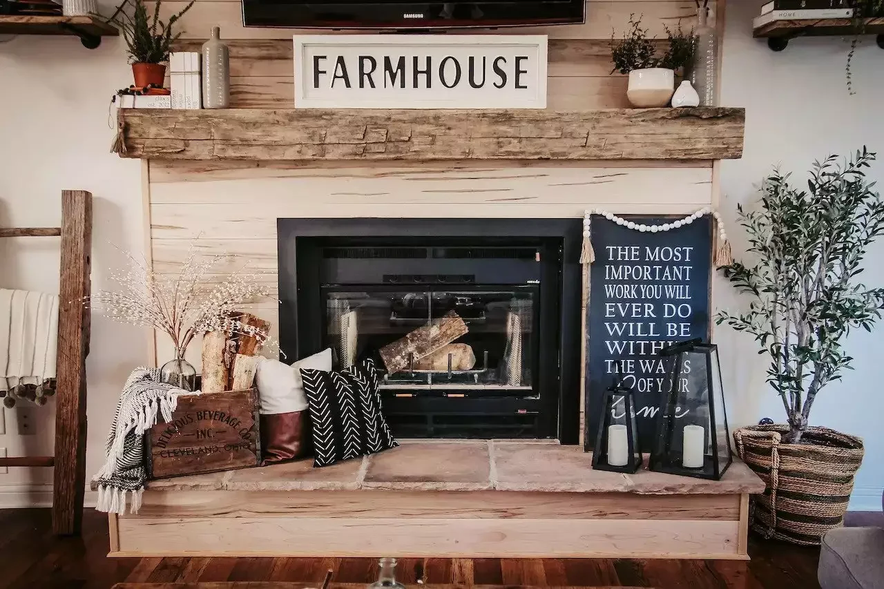 33 Cozy Farmhouse Fireplace Styling Ideas That Transform Your Living Space 28 Make Use of a Blanket Ladder
