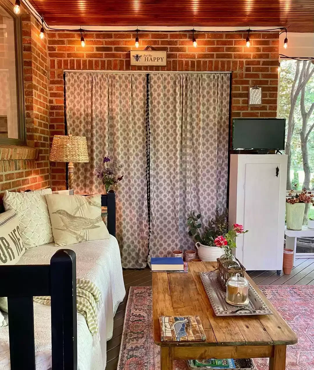31 Brilliant Small Screened Porch Ideas That Make Every Square Foot Count 9 Make Use of a Coffee Table