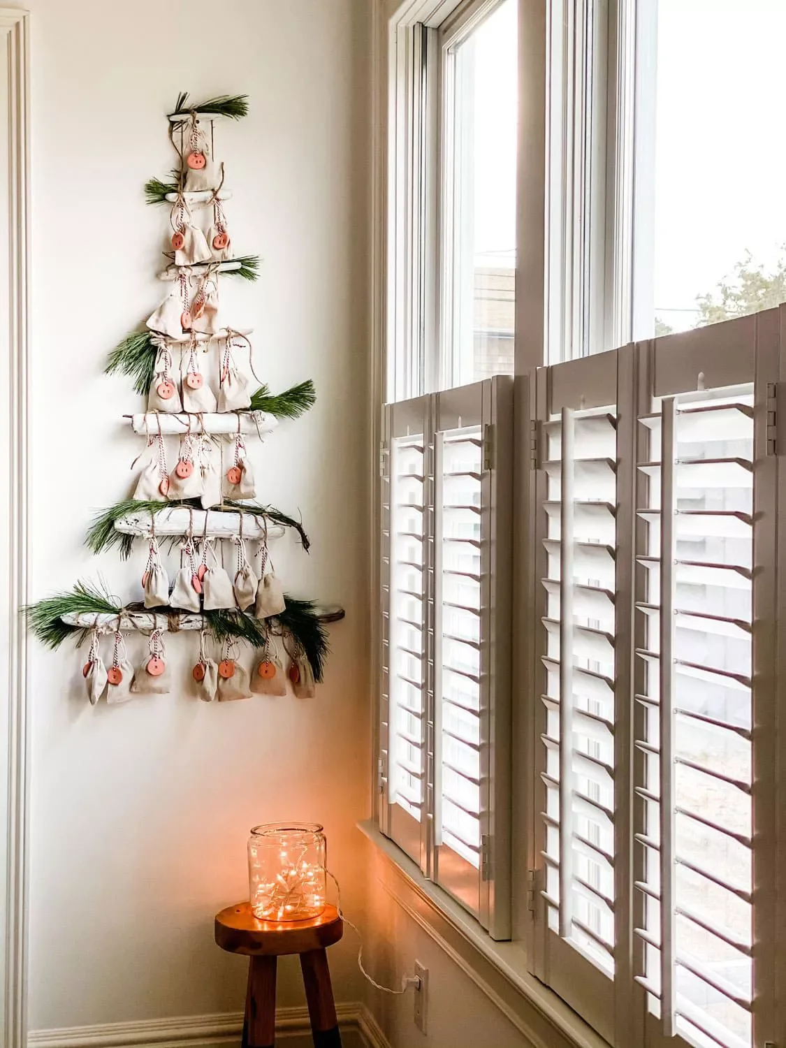 50 Stunning DIY Advent Calendar Ideas That Look Designer-Made 7 Make a Driftwood Wall Hanging