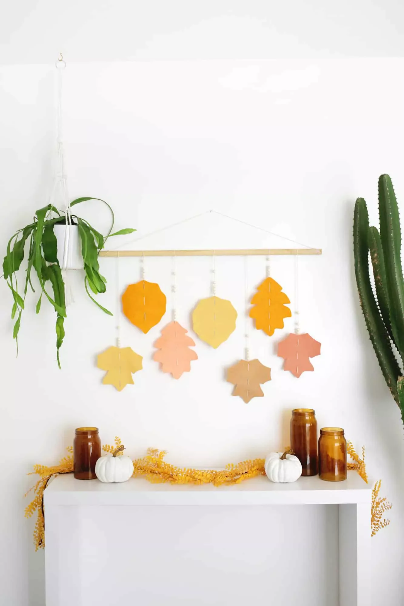 65 Cozy Fall Decorating Ideas to Transform Your Home This Autumn 15 Make a Leafy Wall Hanging
