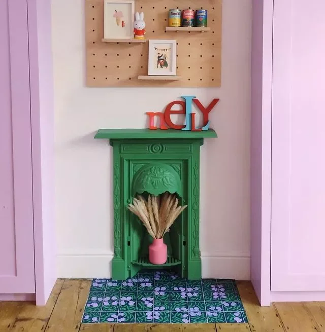 36 Stunning Painted Fireplace Ideas to Transform Your Living Space 15 Make a Petite Fireplace Shine With Green