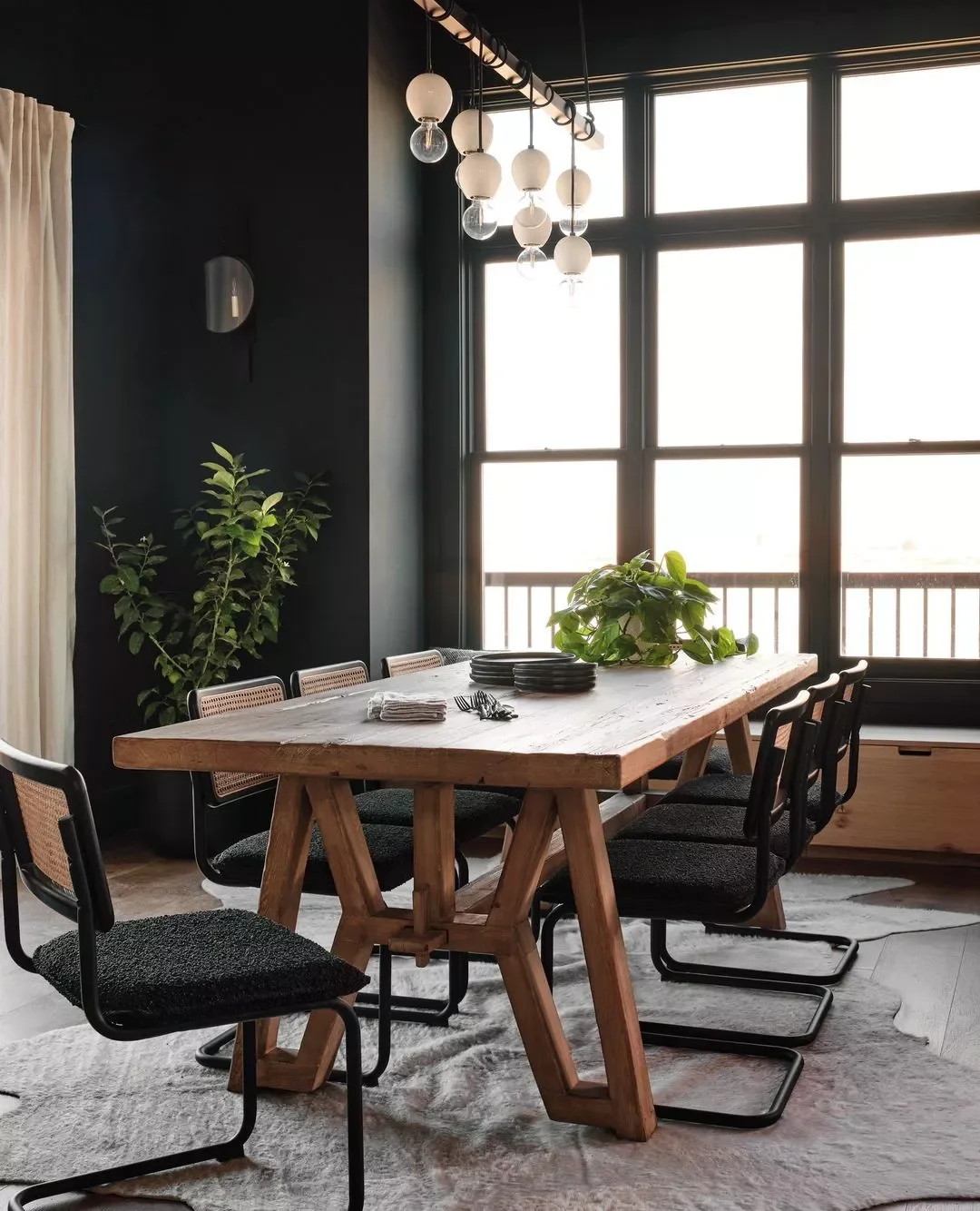 40 Stunning Black Dining Room Ideas to Transform Your Space 38 Match the Trim to the Walls