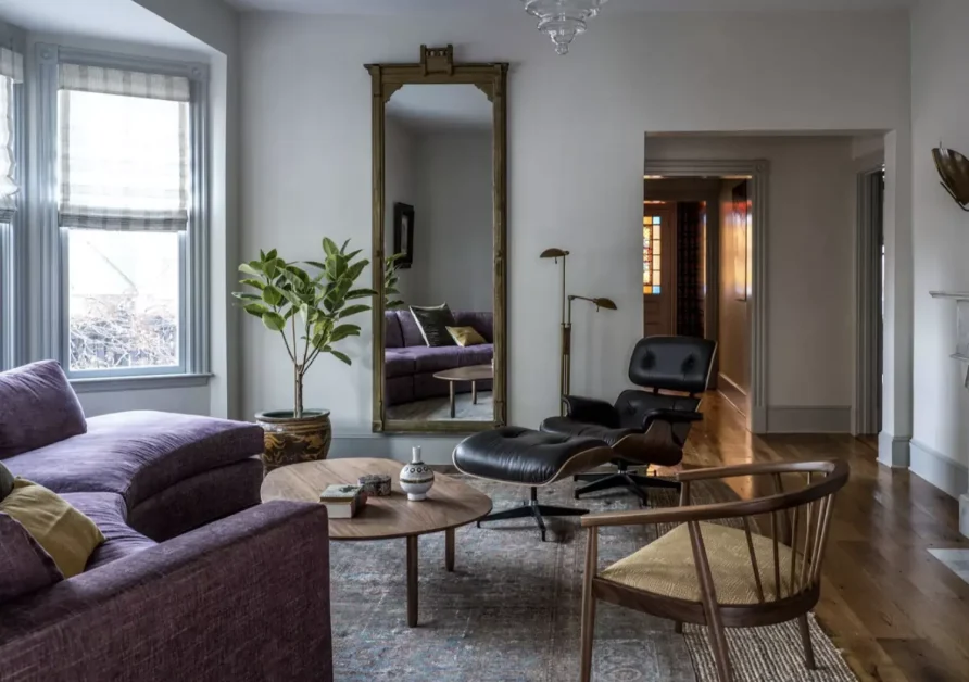 30 Statement-Making Living Room Wall Art Ideas That Transform Your Space 7 Maximize Space with an Oversized Mirror