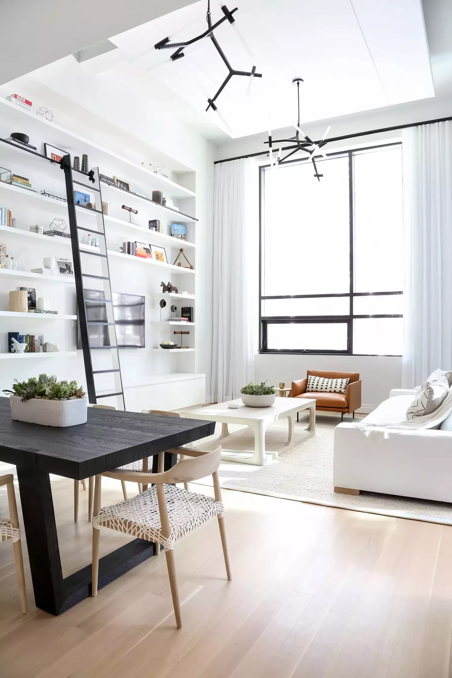 40 Stunning Minimalist Living Room Ideas That Showcase Effortless Style 38 Maximize Vertical Space