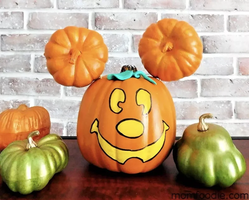 90 Creative Halloween Pumpkin Decorating Ideas to Try This Season 26 Mickey Mouse Pumpkin with Ears