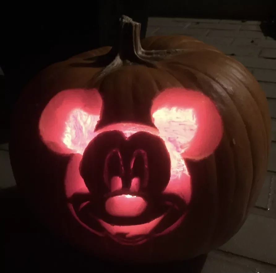 77 Creative Pumpkin Carving Ideas That'll Transform Your Fall Decorating Game 13 Mickey Mouse Pumpkin