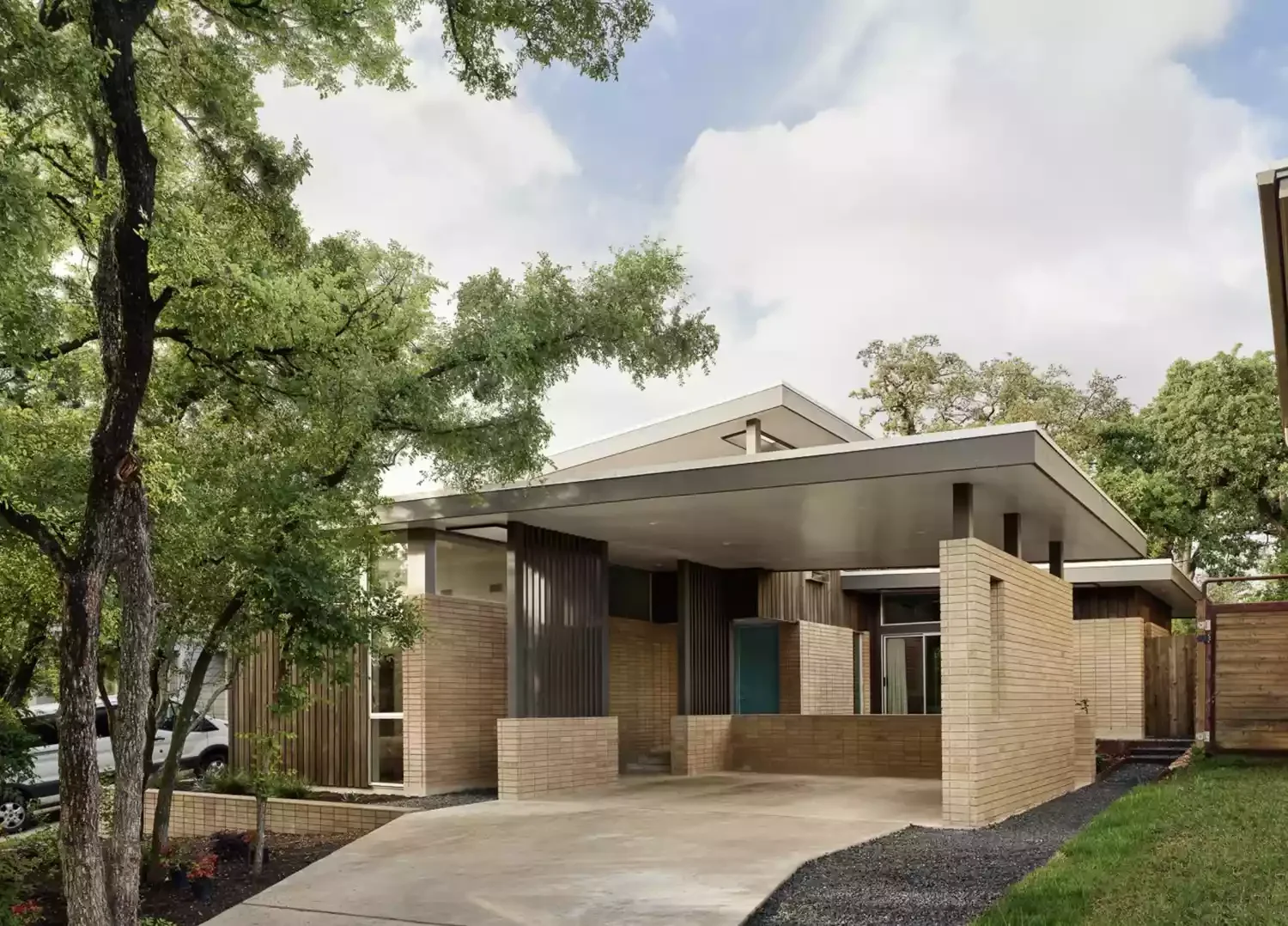 23 Brilliant Carport Designs That Perfectly Merge Beauty and Practicality 6 Midcentury Modern Carport