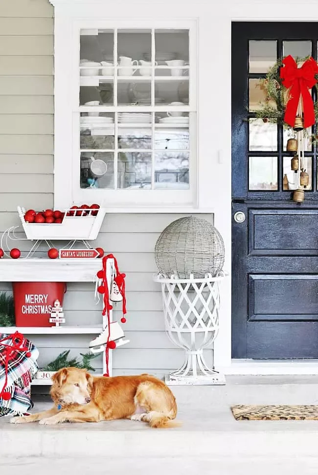 68 Christmas Front Porch Ideas That Make Your Home the Envy Mini Sleigh With Ornaments