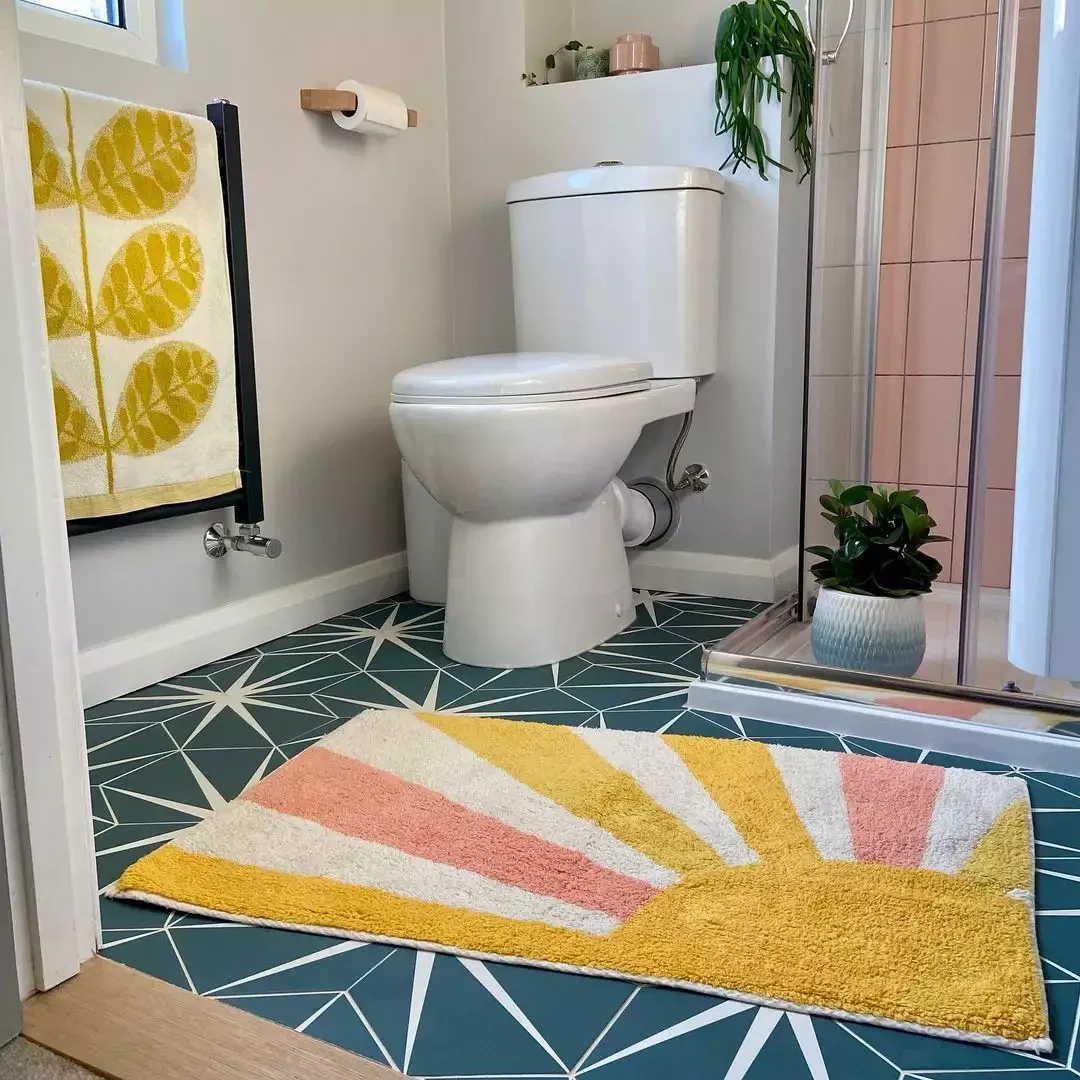 23 Brilliant Bathroom Rug Ideas That Will Transform Your Space 17 Mix Color and Pattern