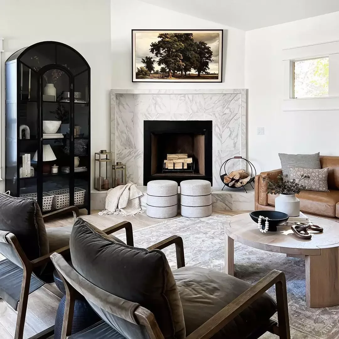 25 Stunning Corner Fireplace Ideas That'll Transform Your Living Space 16 Mix Marble and Warm Tones