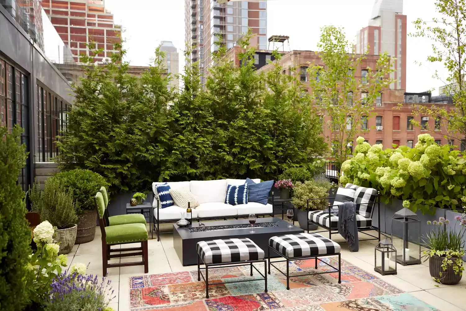 21 Creative Ways to Transform Your Apartment Patio Into an Outdoor Haven 11 Mix and Match Furniture