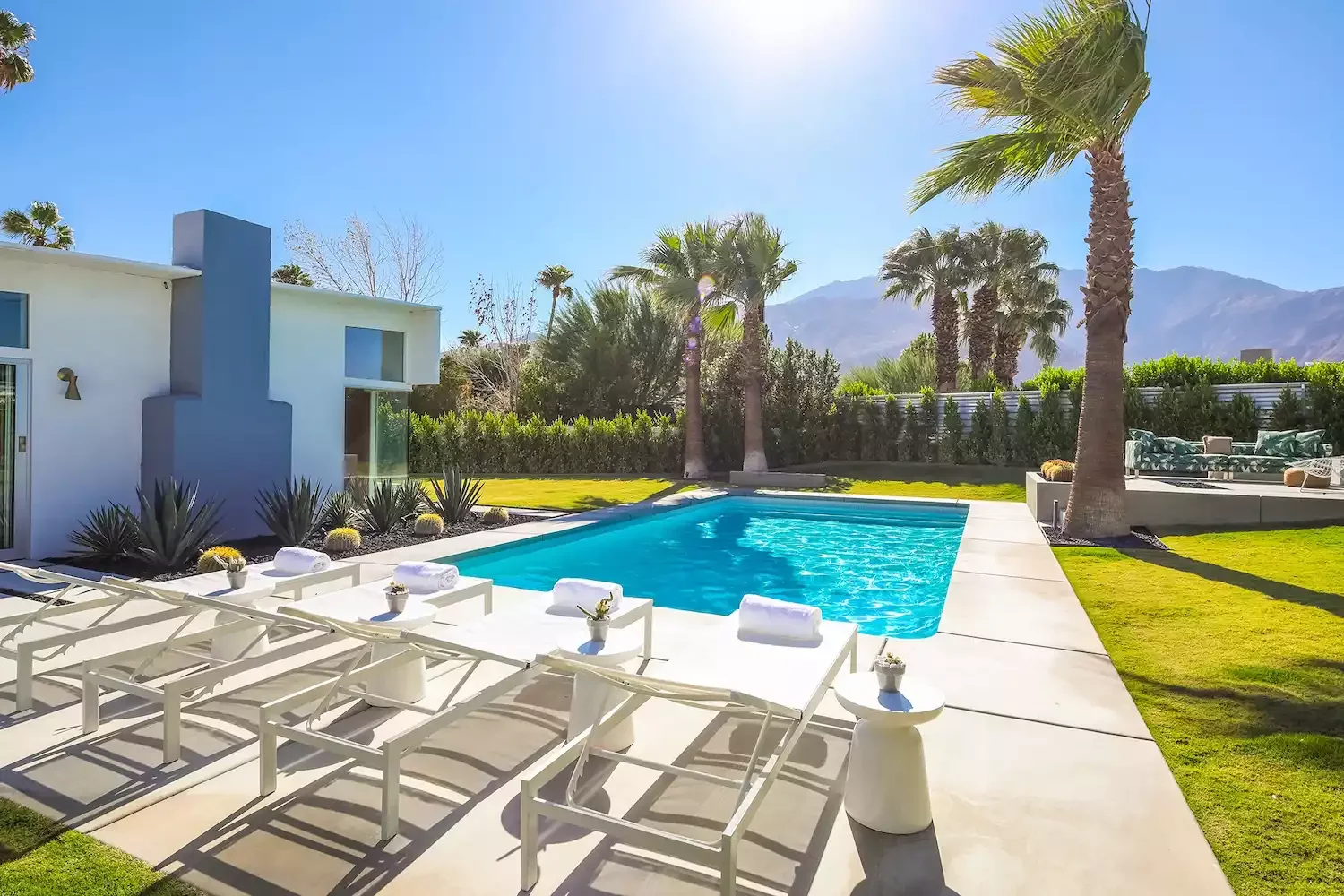 39 Contemporary Backyard Designs That Will Transform Your Outdoor Living Space 28 Mix in a Patterned Sofa