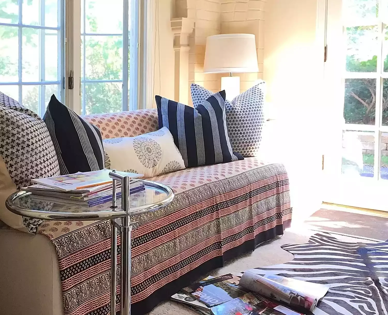 48 Cozy Small Sunroom Ideas That Will Transform Your Space 20 Mixed Pattern Textiles