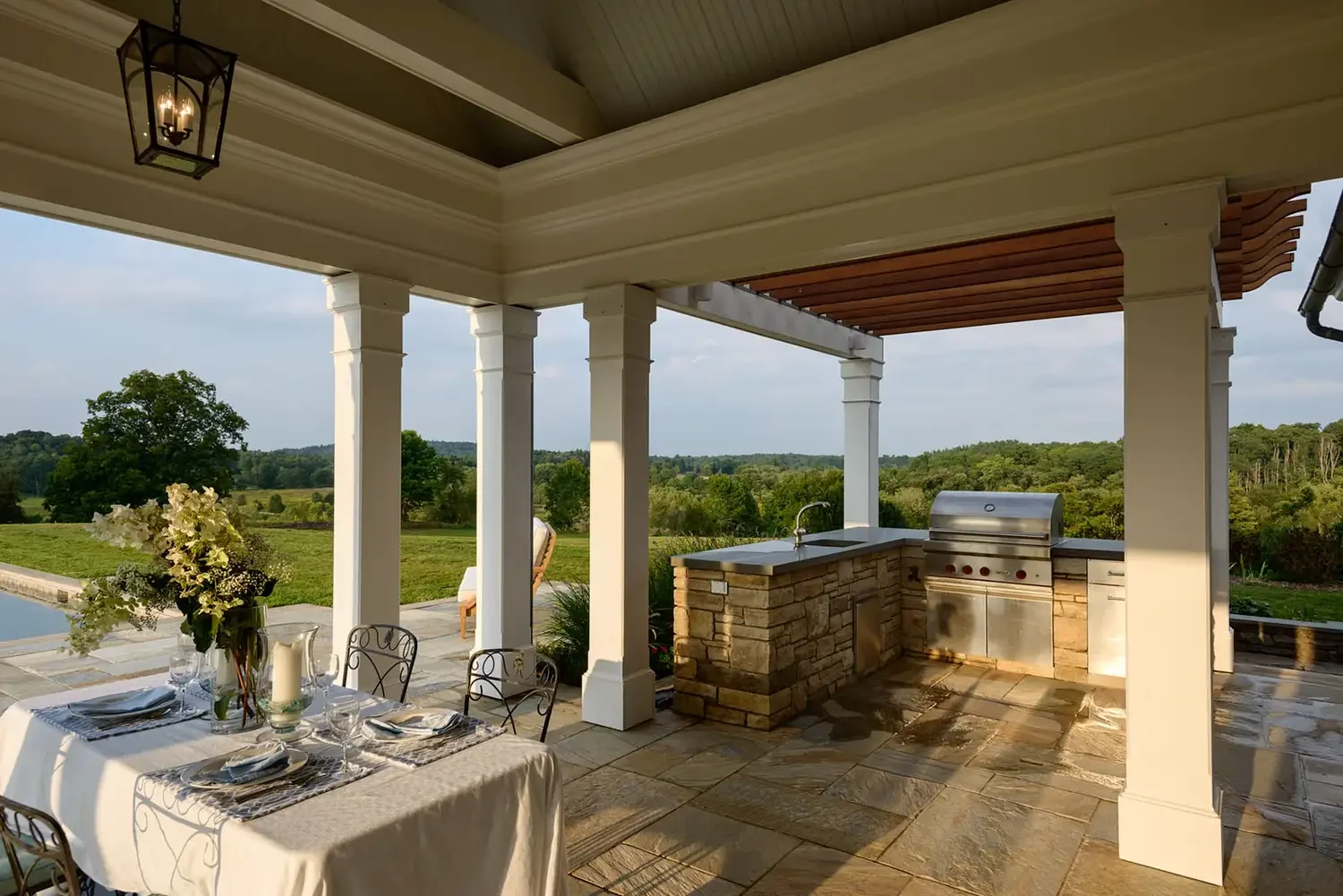 26 Stunning Covered Outdoor Kitchen Ideas to Transform Your Backyard Cooking Experience 21 Mixed Roofing