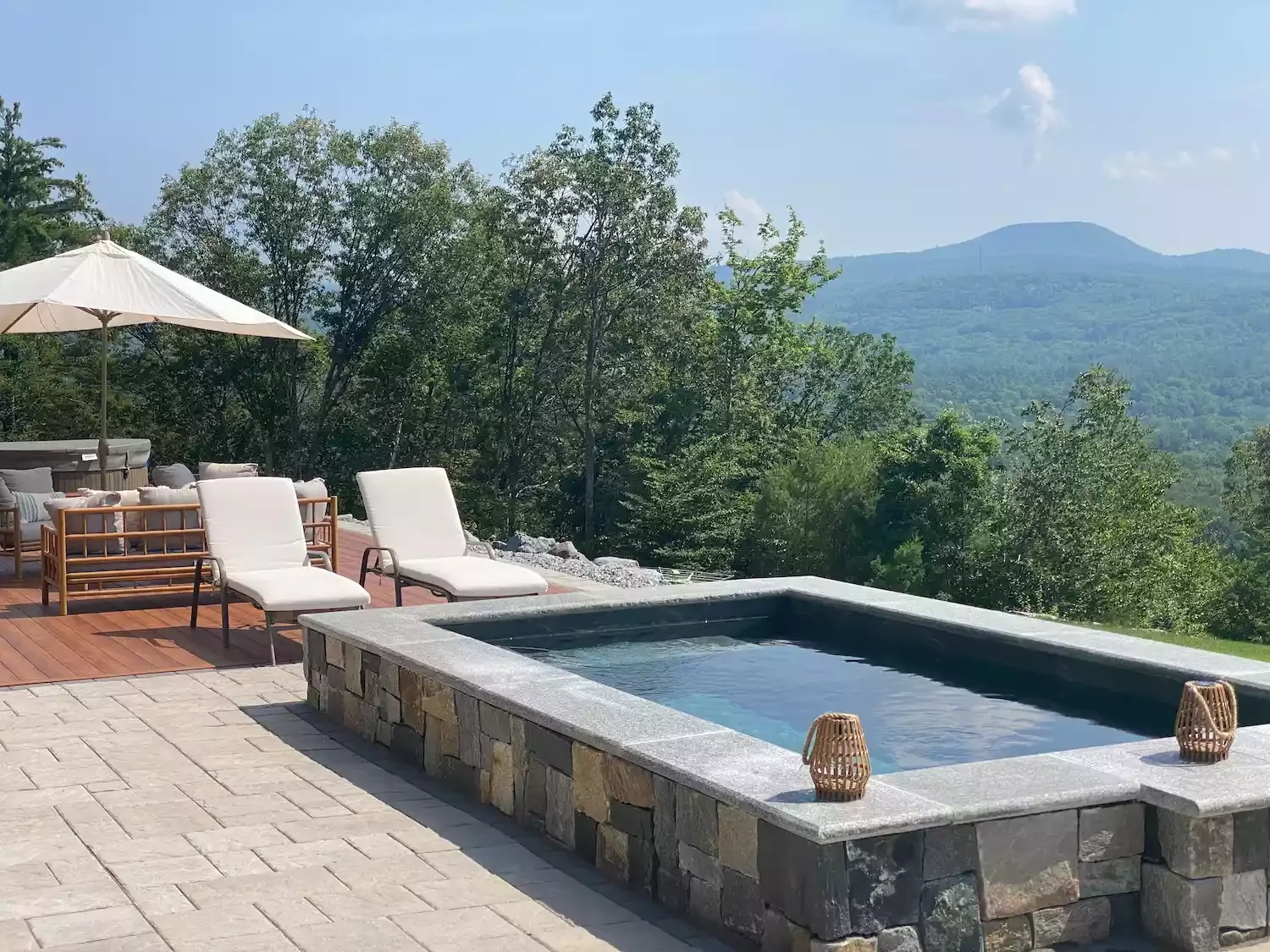 37 Stunning Plunge Pool Designs to Transform Your Backyard Into a Cool Summer Retreat 29 Mixed Stone Plunge Pool