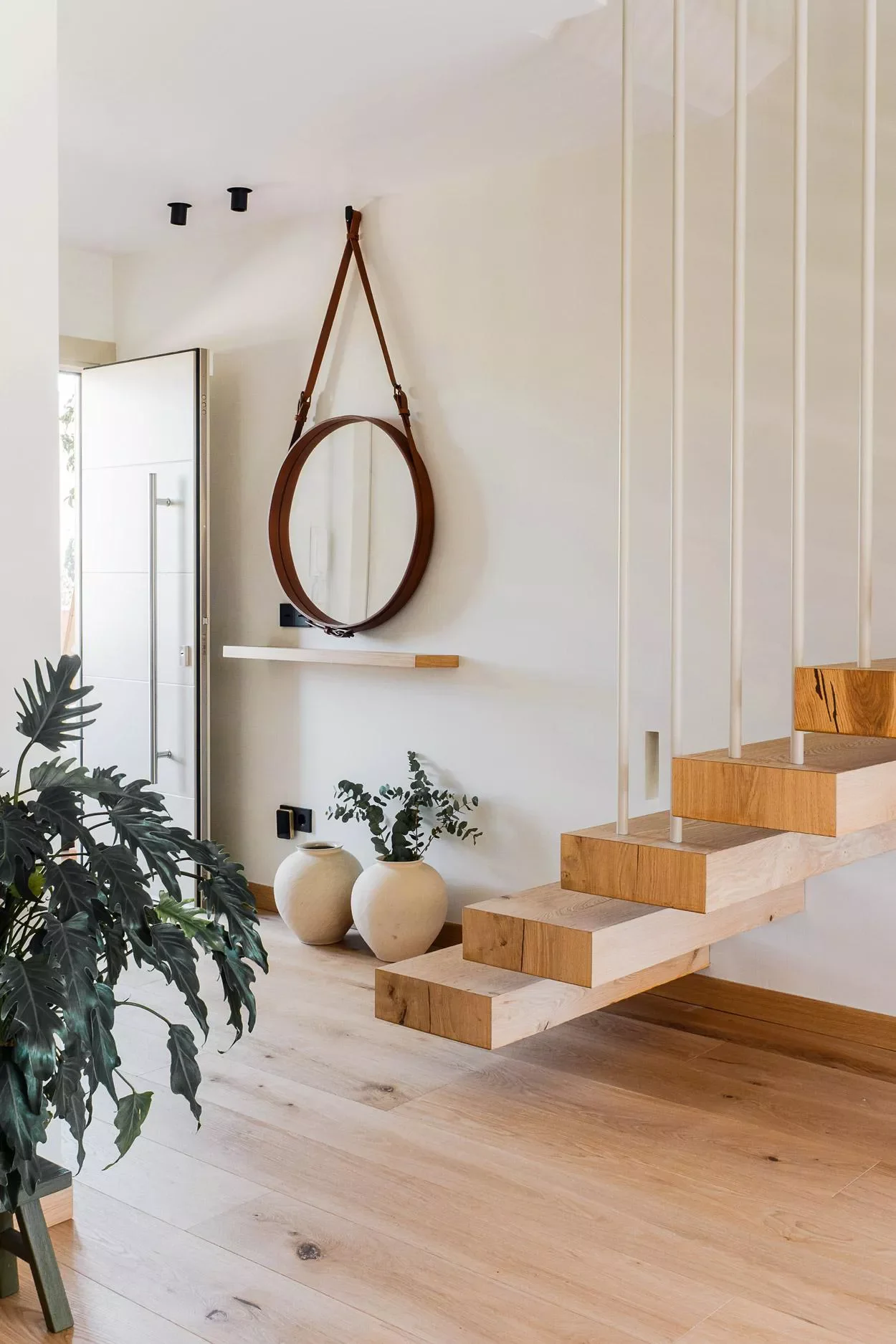 26 Contemporary Staircase Designs That Will Transform Your Home's Style 8 Mixed Wood Staircase