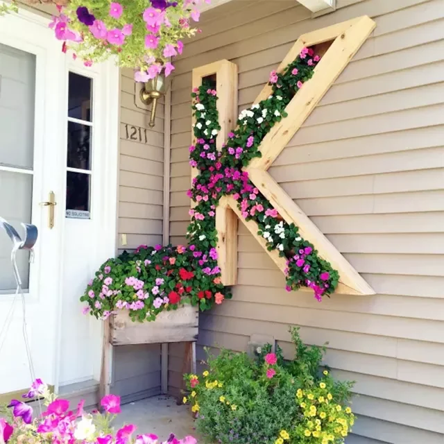 30 Creative DIY Wall Planter Projects to Transform Your Space Monogram Wall Planter