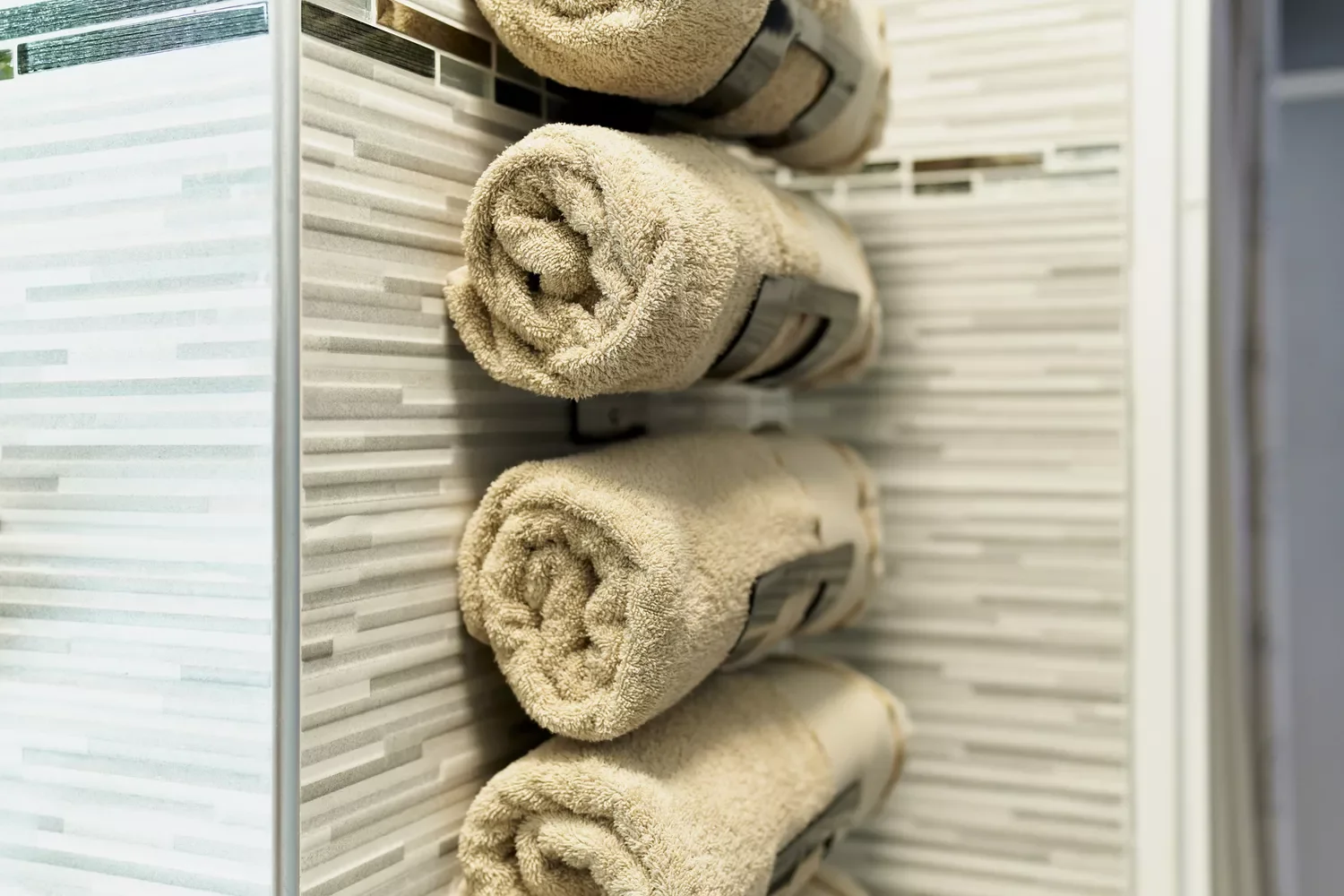 32 Clever and Stylish Ways to Store Your Towels Mount a Towel Rack on the Wall