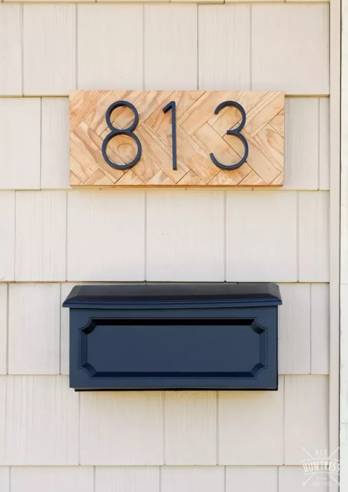 40 Creative House Number Ideas That Will Transform Your Home's Curb Appeal Mount on Herringbone Wood