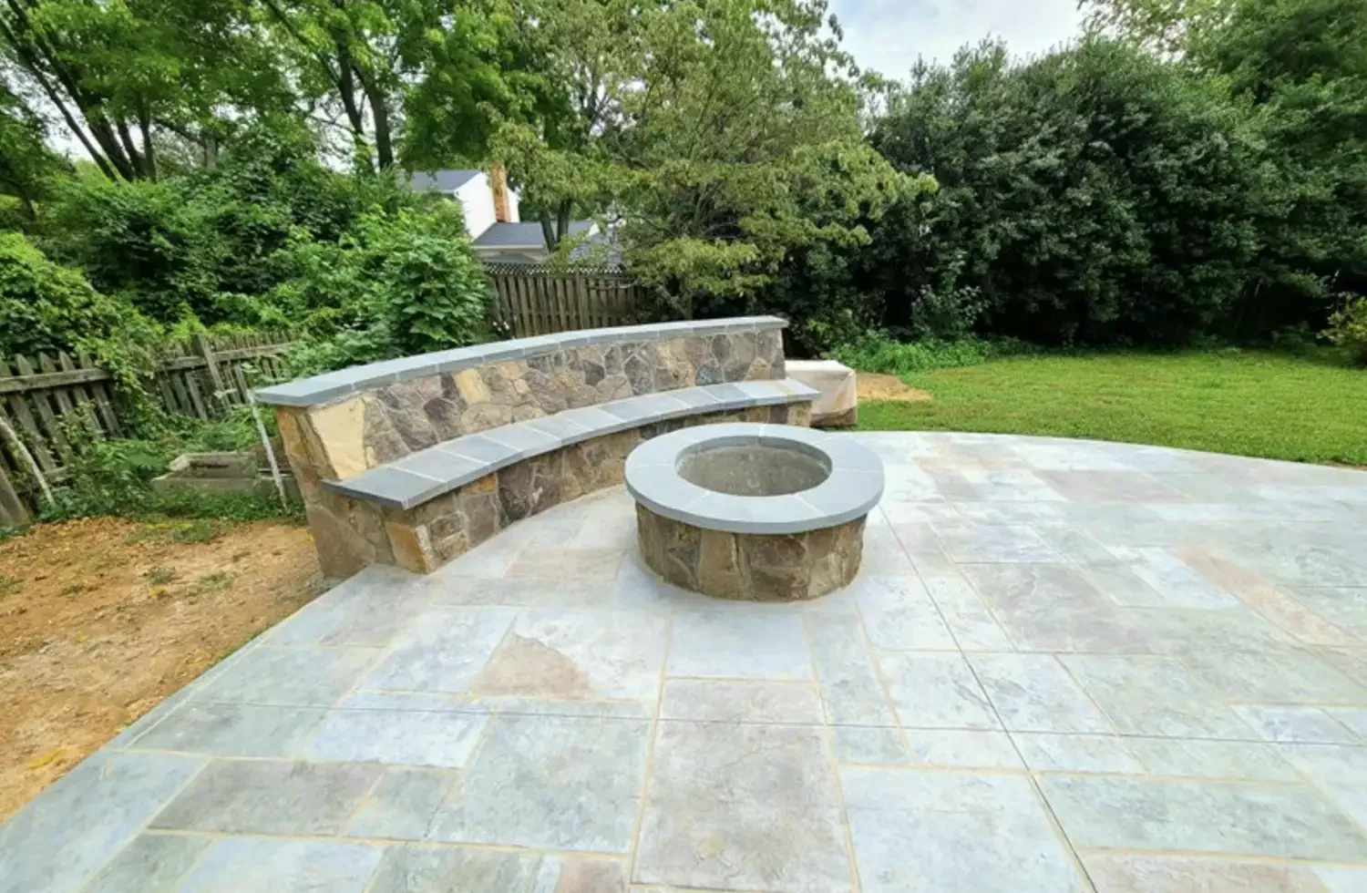 21 Beautiful Stone Fire Pit Designs That Will Transform Your Backyard 4 Multi-Color Slate Patio With Cozy Fire Pit