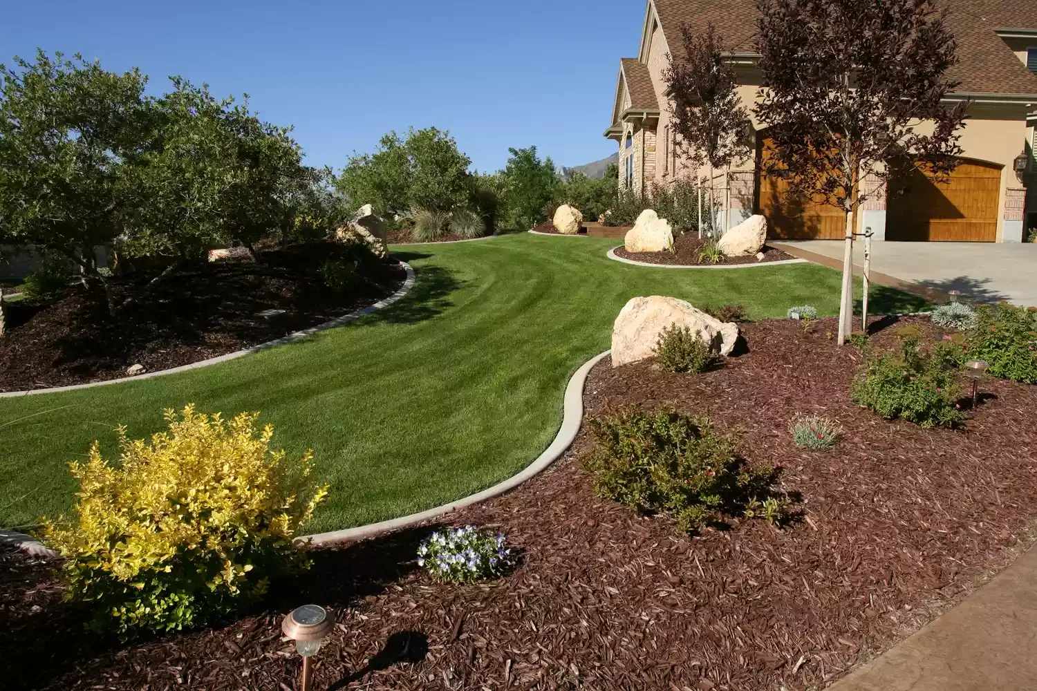 30 Stunning Front Yard Ideas Using Rocks and Mulch Multiple Garden Areas