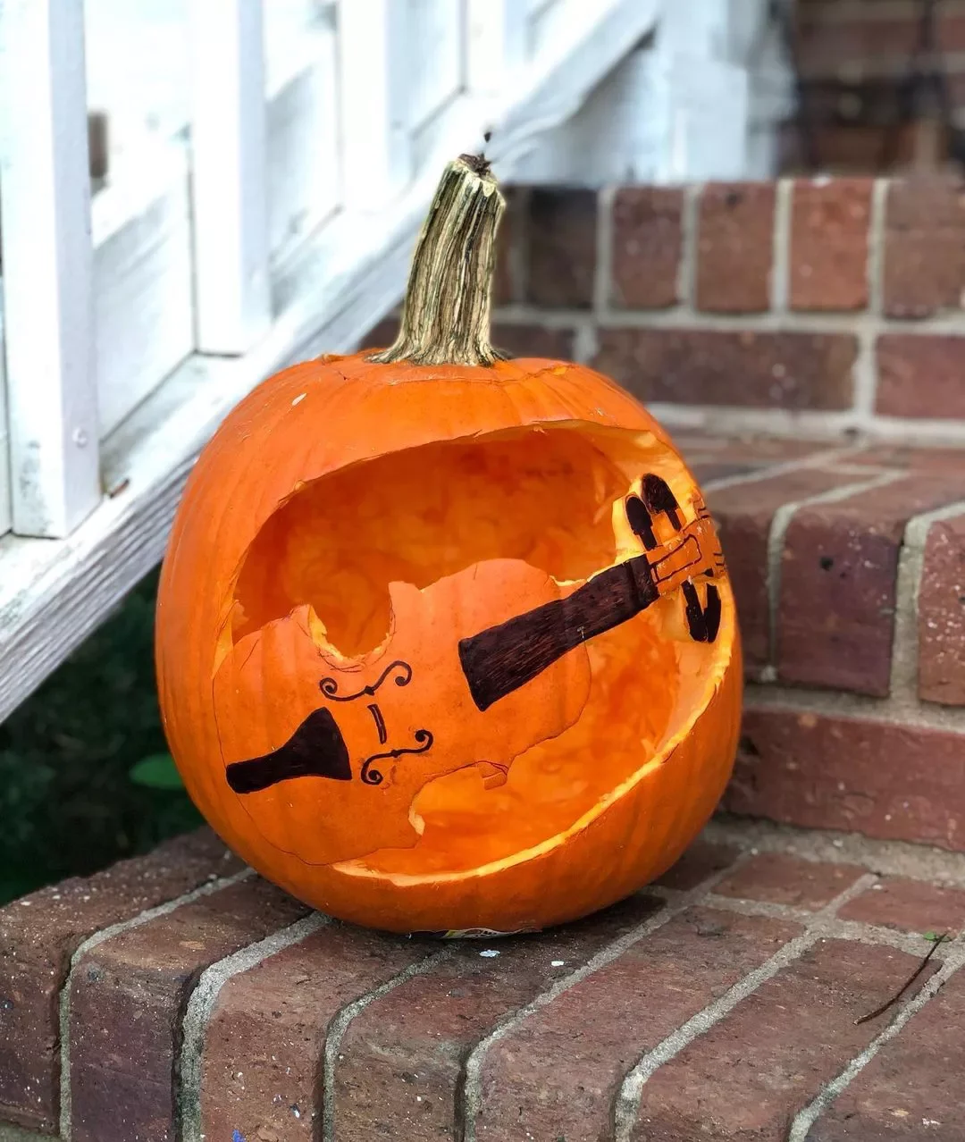 77 Creative Pumpkin Carving Ideas That'll Transform Your Fall Decorating Game 21 Musical Instrument Pumpkin