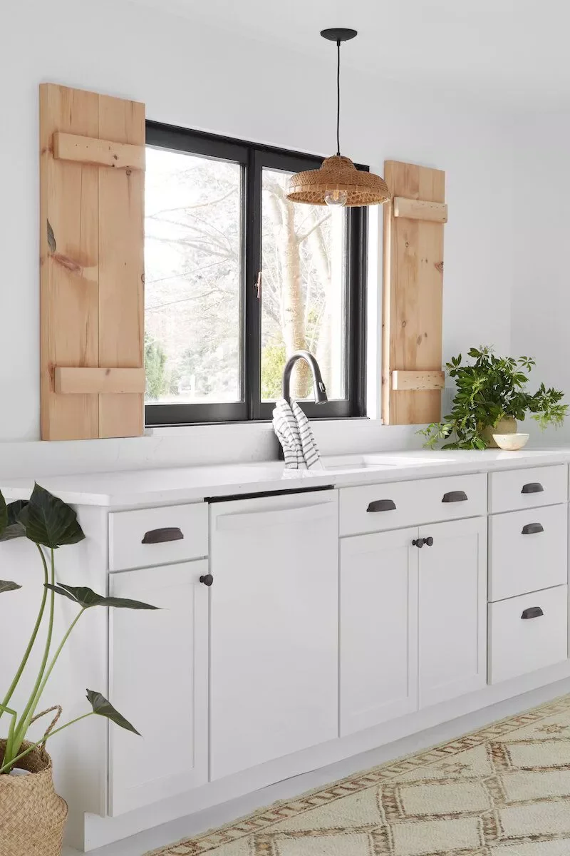 57 Beautiful Window Treatment Ideas That Transform Any Room on Any Budget 45 Natural Wood Shutters