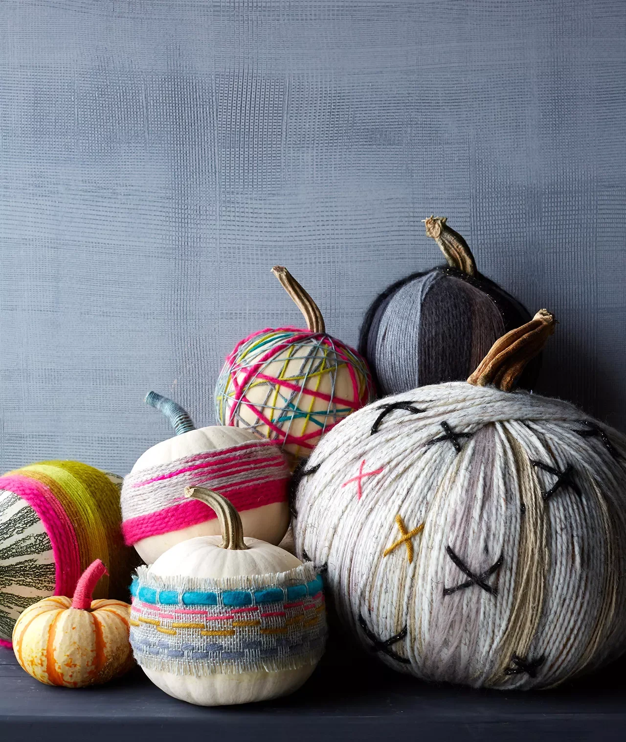 80 Quick Halloween Crafts You Can Complete in One Day 42 No-Carve Pumpkins Decorated with Yarn