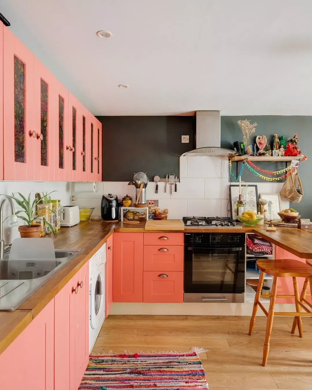 30 Stunning Pink Kitchen Designs That Show Why Pink Is the Ultimate Neutral 18 Opt for Coral Cabinets