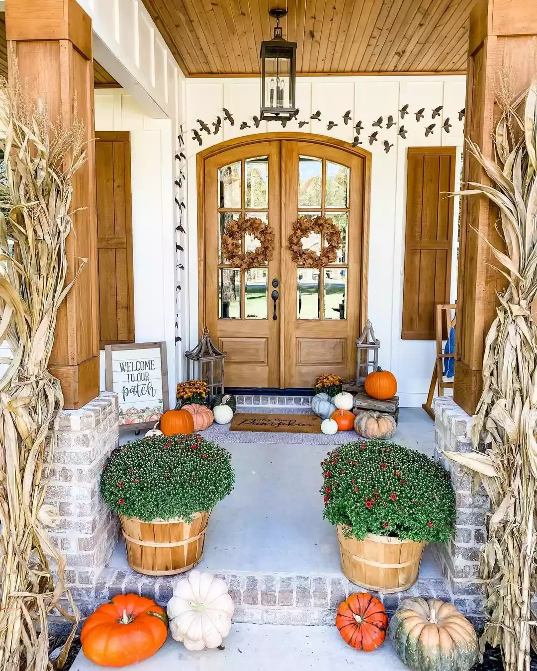 33 Spooktacular Halloween Front Porch Ideas That'll Make Your Home the Neighborhood's Must-See Destination 26 Opt for Crows Over Bats